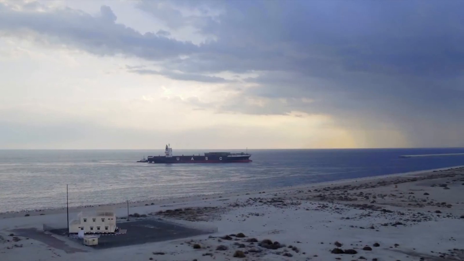 A vessel heading toward the horizon off the Duqm shore